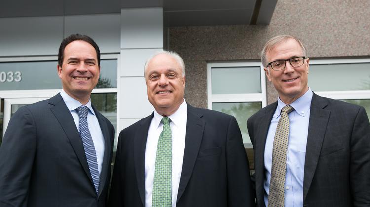 (L,R) Credit Suisse Managing Director Dan Seabolt, Site Lead Jim Captain and Wilson Ervin, vice chairman of Credit Suisse’s group executive office in New York, gathered at Credit Suisse's building in Research Triangle Park on May 9, 2017, to announce the company will be creating 1,200 new jobs in the region.