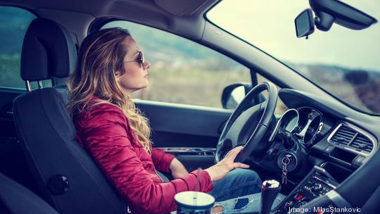 Woman driving car