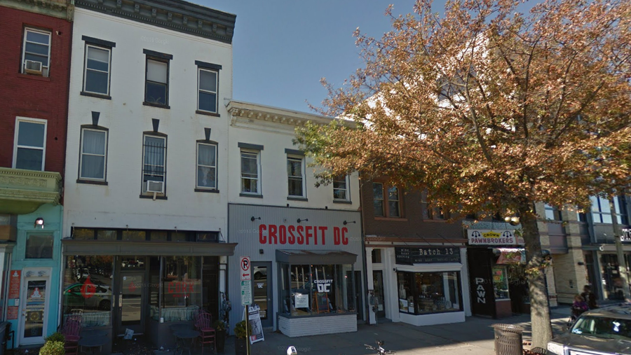 Cork Wine Bar may close its original 14th Street location, move into