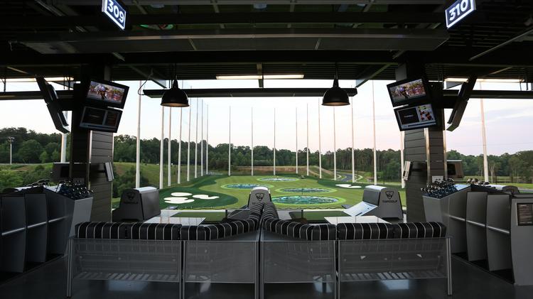 The first phase of an entertainment district in University City includes a Topgolf facility — Charlotte's second — at 7199 MacFarland Blvd., that will open this summer. This file photo shows the first Topgolf location to open in Charlotte. 