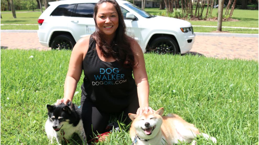 Downtown Dog Walker This Central Florida woman earns a good living doing what she loves
