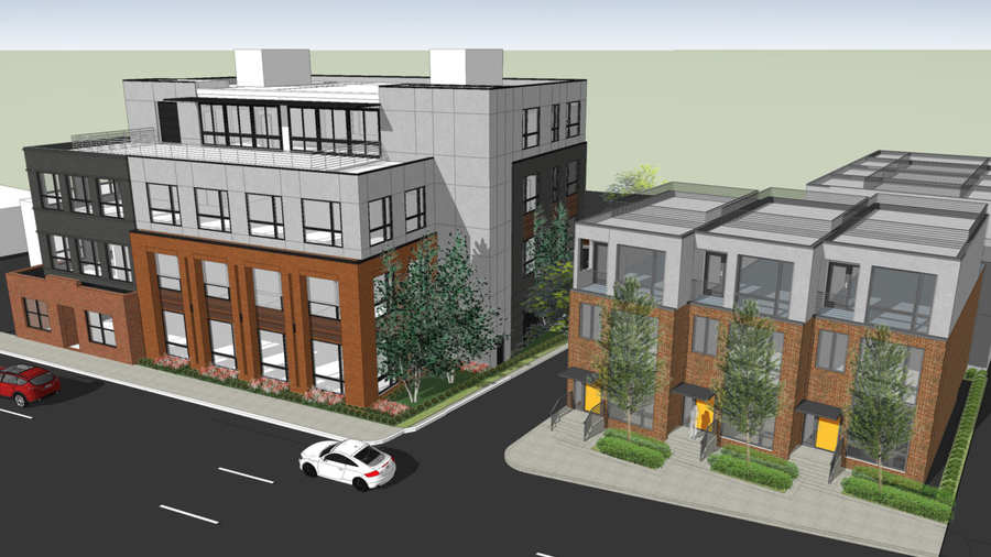 Italian Village commercial strip springing from the ground north of