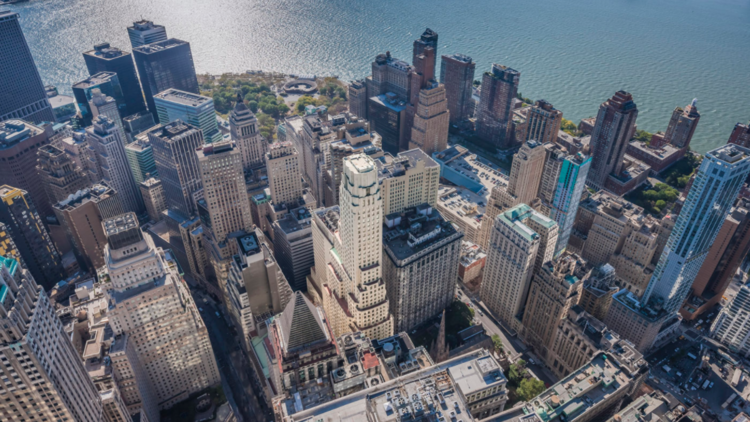 The skyline of the financial district in New York. U.S. bankers have warned about mounting risks in commercial real estate, with figures showing they are putting the brakes on loans to buyers of office buildings, hotels and shopping malls.