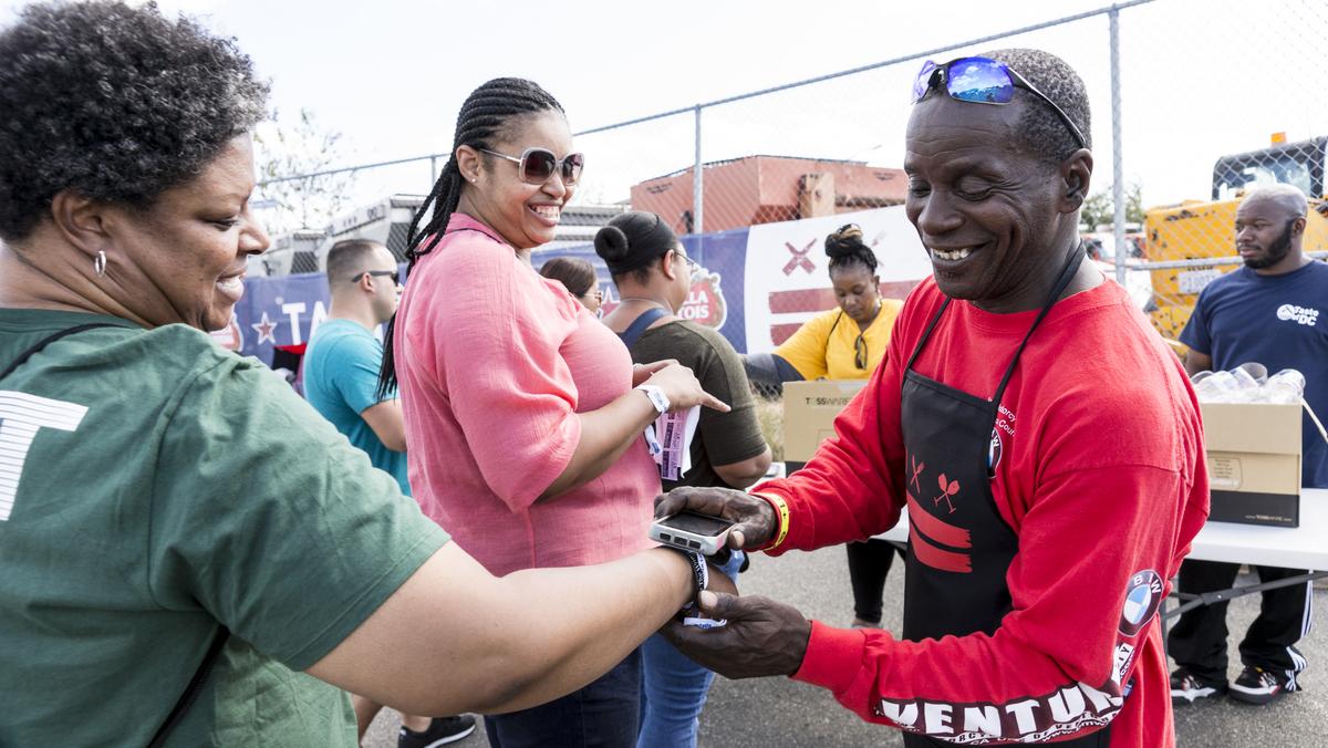 Taste of D.C. attendees face long lines, tech fails in new RFK Stadium