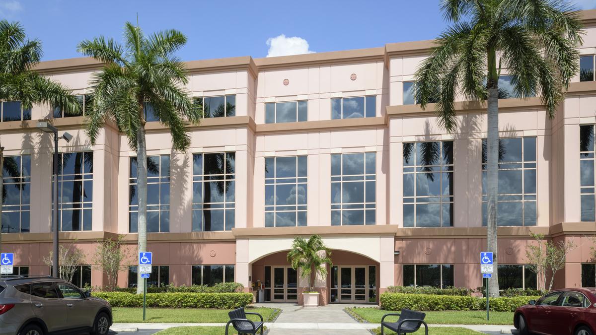TA Realty sells International Place II in Sawgrass International