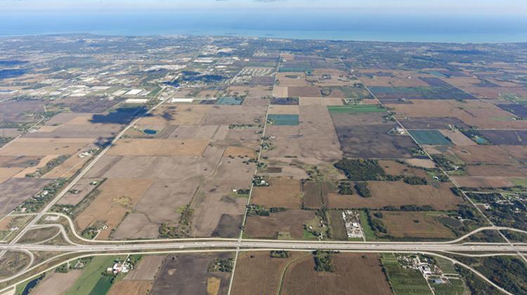 The village spending would help transform farmland east of Interstate 94 into a manufacturing plant with up to 13,000 jobs.