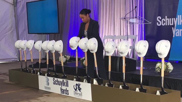 A worker prepares the ceremonial shovels for the Schuylkill Yards groundbreaking on Nov. 8, 2017.