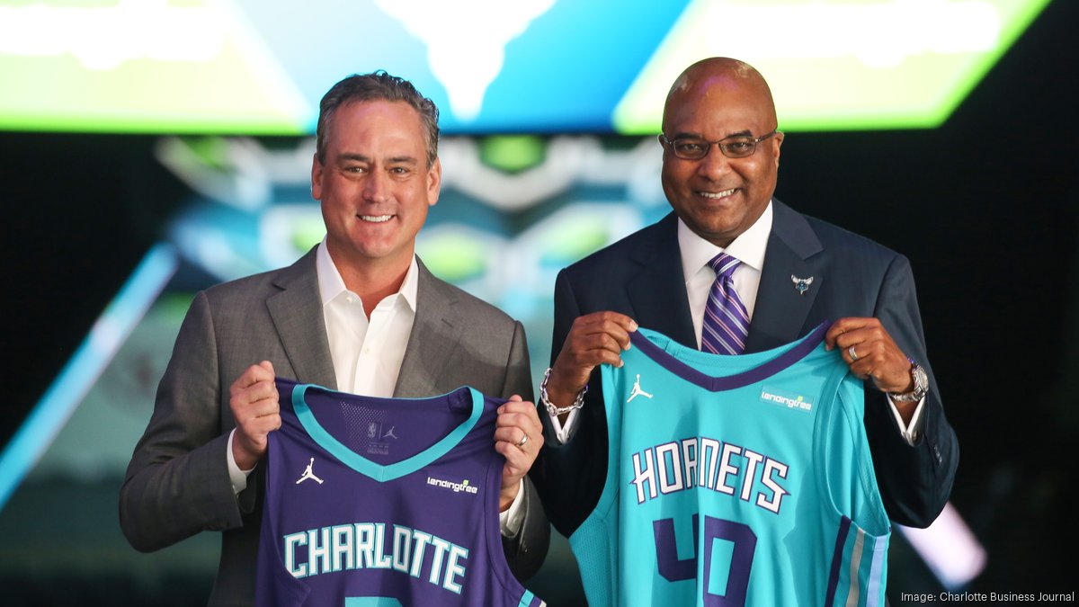 Charlotte Hornets - AWESOME! Hornets Chairman Michael Jordan and  LendingTree CEO Doug Lebda celebrating the team's new jersey patch deal!  #BuzzCity
