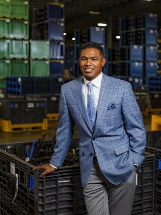 Condrad Daniels, president of HJI Supply Chain Solutions, poses for a portrait inside his east end facility.