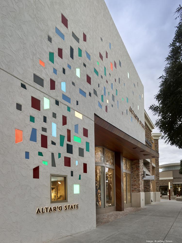 Knoebel Construction has built 50 Altar'd State stores, including this one in Albuquerque with pueblo revival characteristics and kaleidoscopic stained glass features.