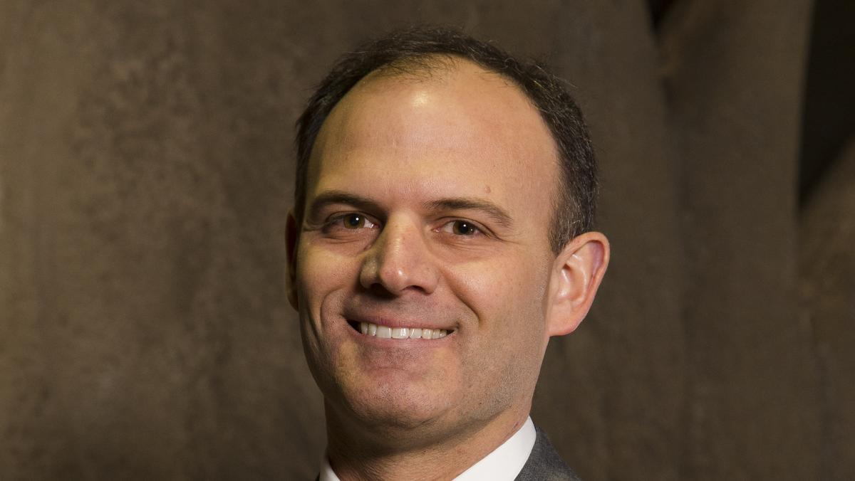 Greg Holland works with Fortune 500 companies while taking a mentorship