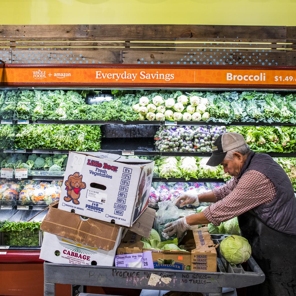 is buying more than groceries with Whole Foods — it's also getting  more than 400 stores to use as delivery hubs - Vox