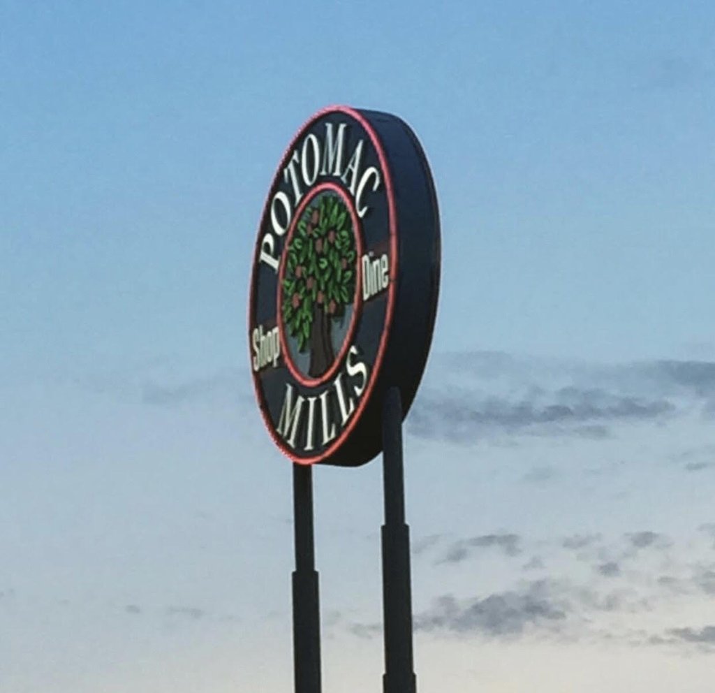 Leaning Potomac Mills sign removed after windstorm 
