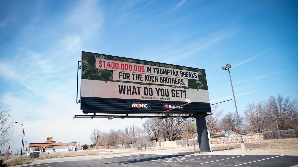 Group targets Wichitabased Koch Industries Inc. with billboards as