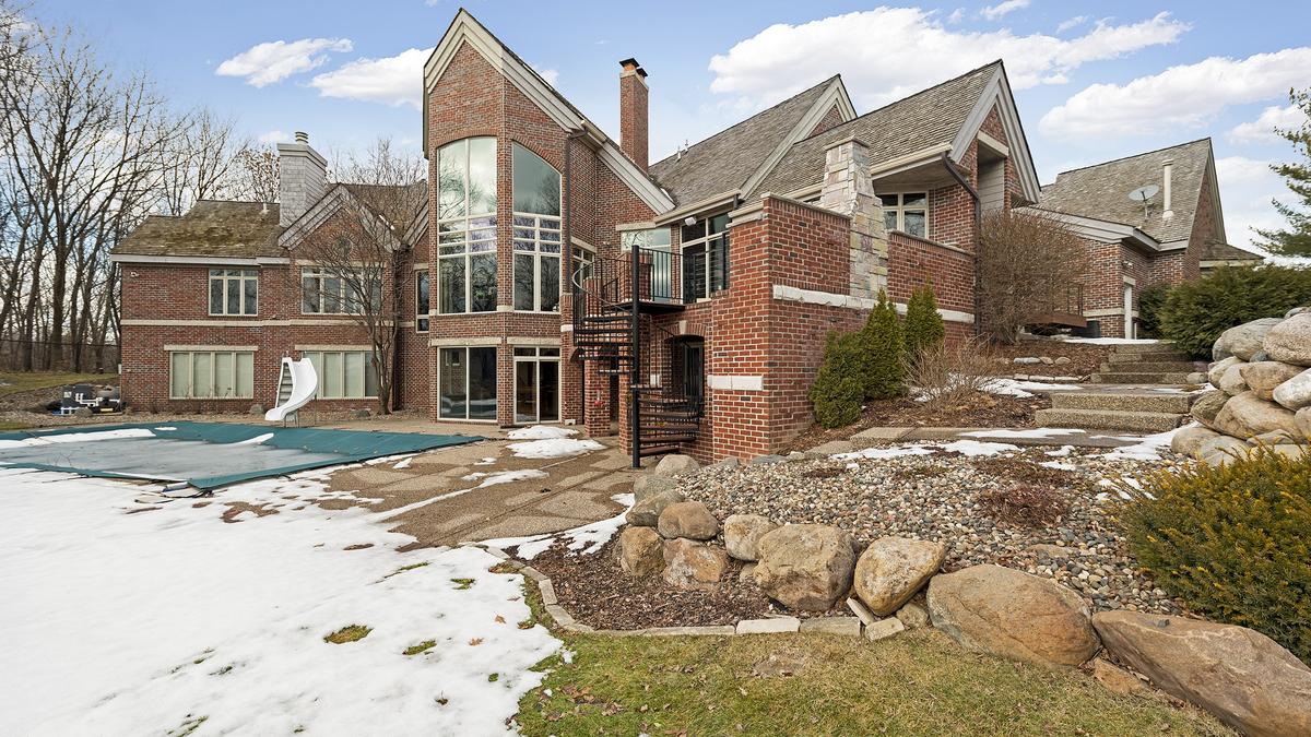 Dream Homes Private Chanhassen home with basketball court, outdoor