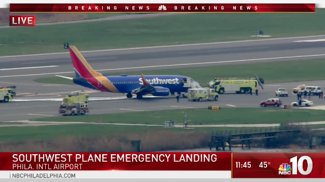 Southwest Airlines 737-700 makes emergency landing in Philadelphia following apparent engine ...