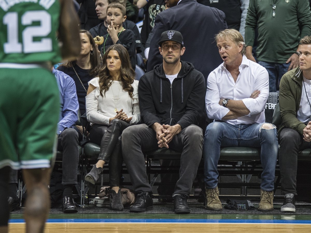 Packers' Aaron Rodgers, Danica Patrick Sit Courtside at Bucks Game