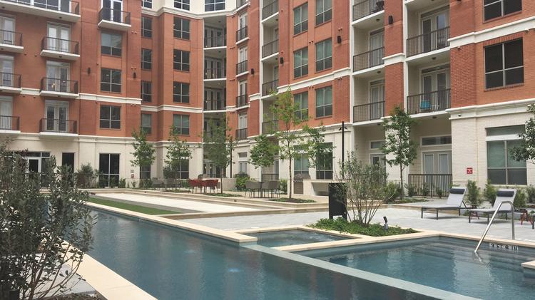 Top 10 Houston Submarkets Where Rents Grew The Fastest In First The Outdoor Pool And Lounge Area At Mark In Springwoods Village A New Report