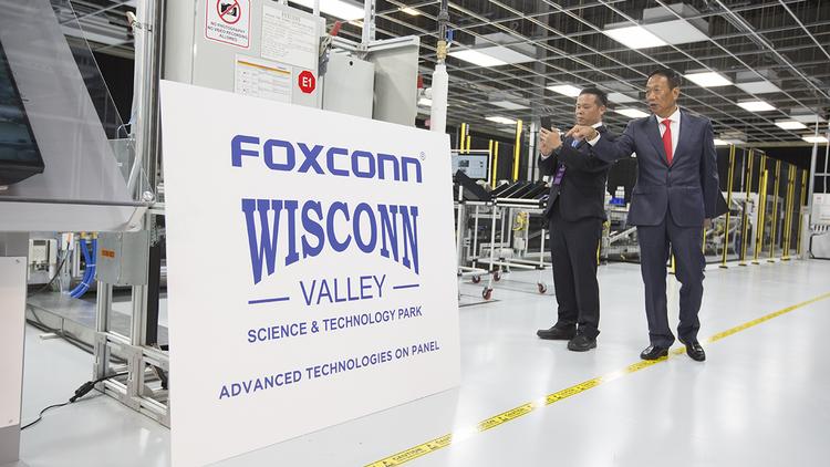 Foxconn Falls Short On Job Goal In 2018 Milwaukee Business Journal - foxconn chairman terry gou points out the sign on display at a groundbreaking ceremony in mount