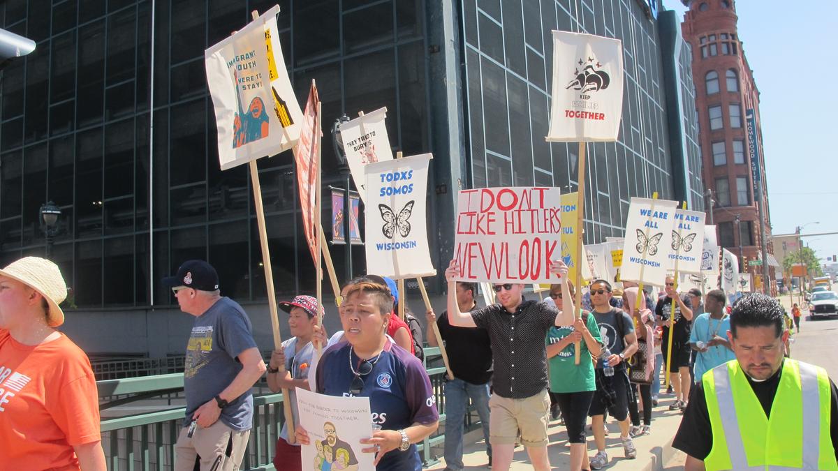 Demonstrators gather in downtown Milwaukee to protest Trump's policies ...