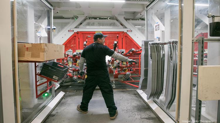 A Tesla employee inside the company's factory in Fremont, California.