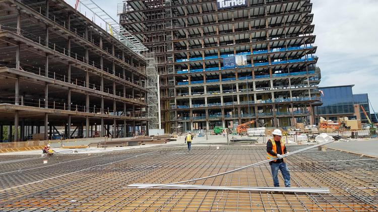 Crews work on the first phase of BioMed Realty's Gateway of Pacific project.