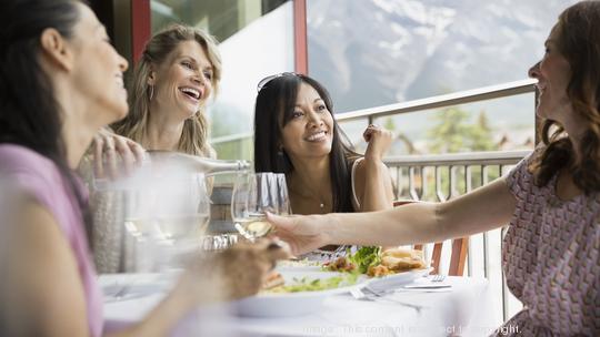 Women eating together in restaurant