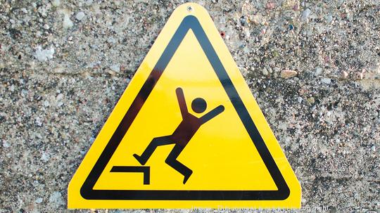 Warning sign that shows risk of falling