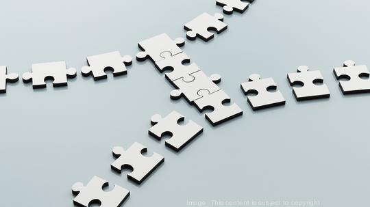 Jigsaw pieces merger acquisition