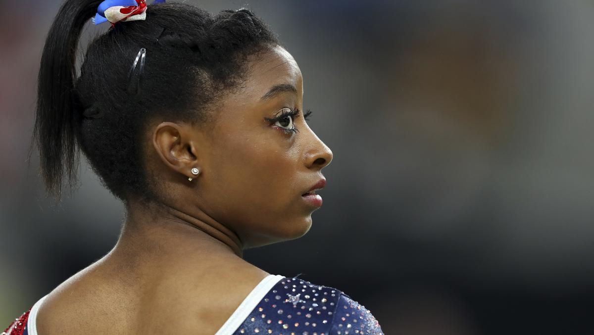 simone biles suing fbi