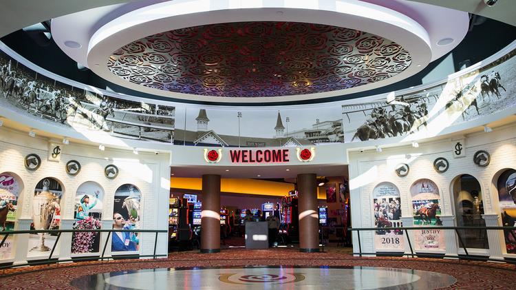 Installations commemorating this year's Kentucky Oaks and Kentucky Derby winners are surrounded by Churchill Downs and Derby-themed decor.