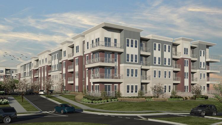 A rendering of one of the four-story residential buildings at District at Deerfield.