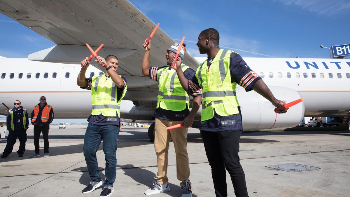 United Airlines Gets Help From Bears Players Entertaining