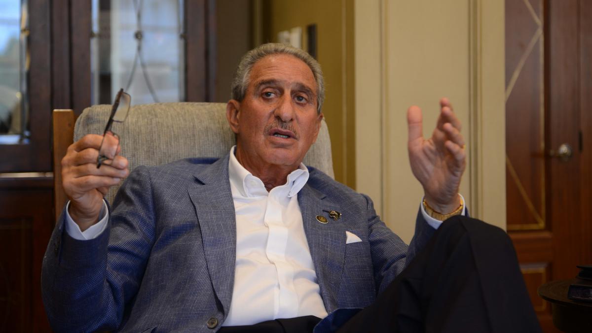 Atlanta Falcons owner Arthur Blank models a new Falcons' jersey during a  press conference and fashion show at the Mall of Georgia in Buford, Ga.,  Thursday, April 24, 2003. The Falcons unveiled