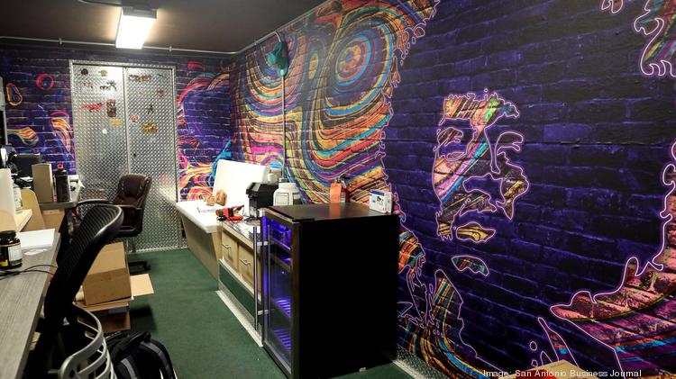 Art work is painted on the walls at Cruising Kitchens allowing their employees to create ideas.