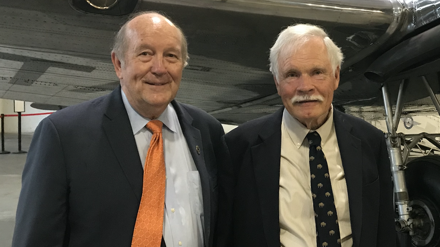 Atlanta Braves owner Ted Turner (left), announces at a news