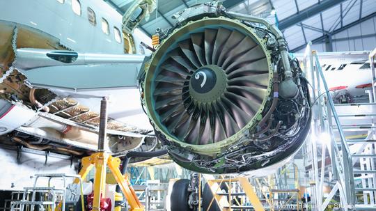 Detail of jet engine in aircraft maintenance factory