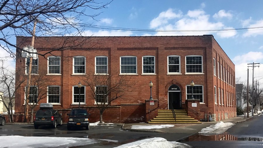 Grey Ghost Bicycles owners buy former Post Star building from owner of