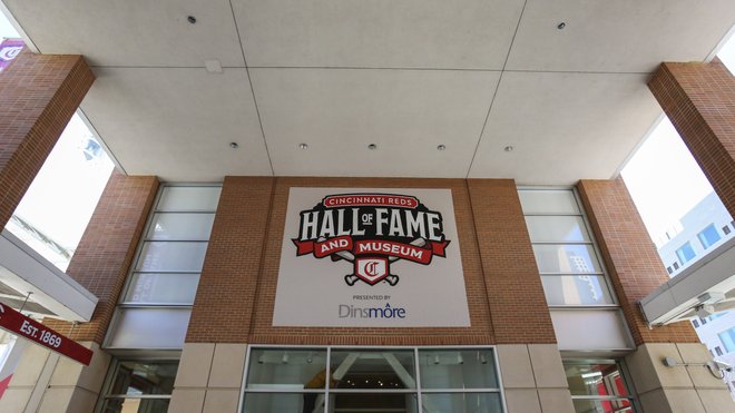 People tour the Cincinnati Reds Hall of Fame and Museum in