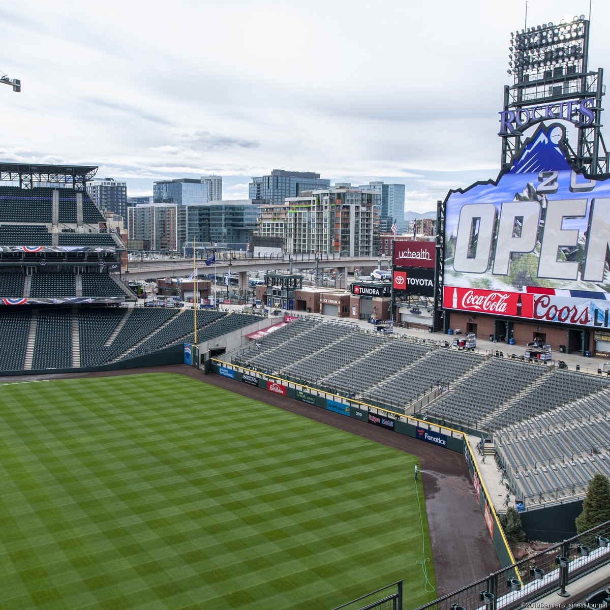 Rockies practice under Coors Field lights