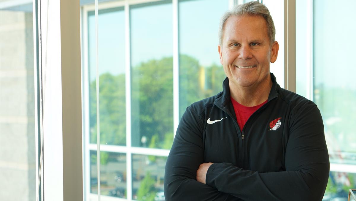 Fred Meyer Stores Inc.'s Dennis Gibson checks a big one off his list