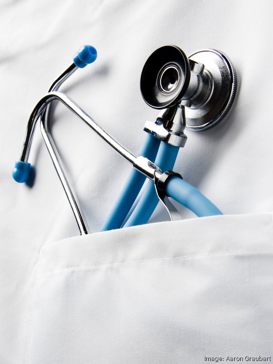 Stethoscope in doctor's pocket – Getty