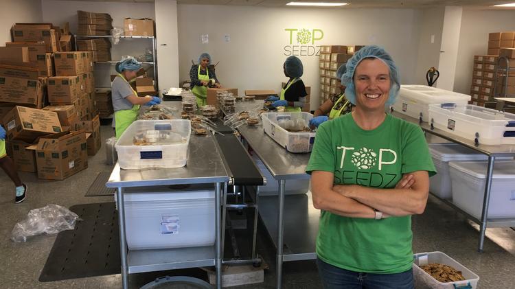Rebecca Brady is the founder and owner of Top Seedz. The cracker products are made out of commercial space in Cheektowaga.