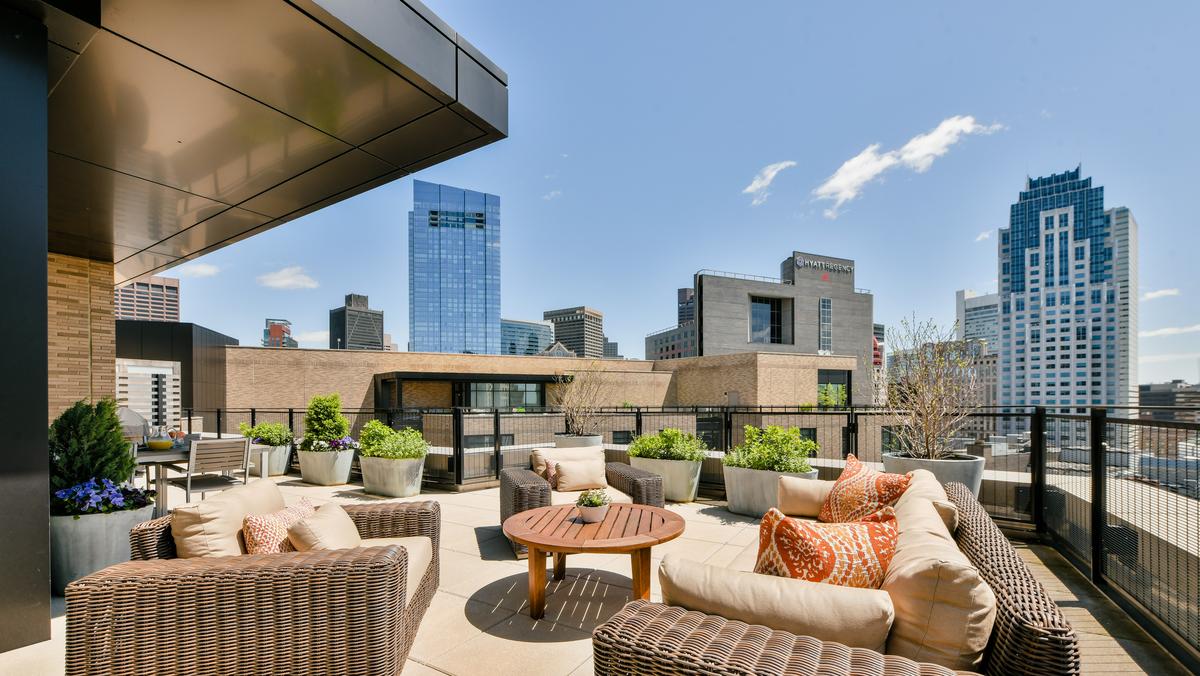 This 4.3M Millennium Place penthouse has a roofdeck and solarium
