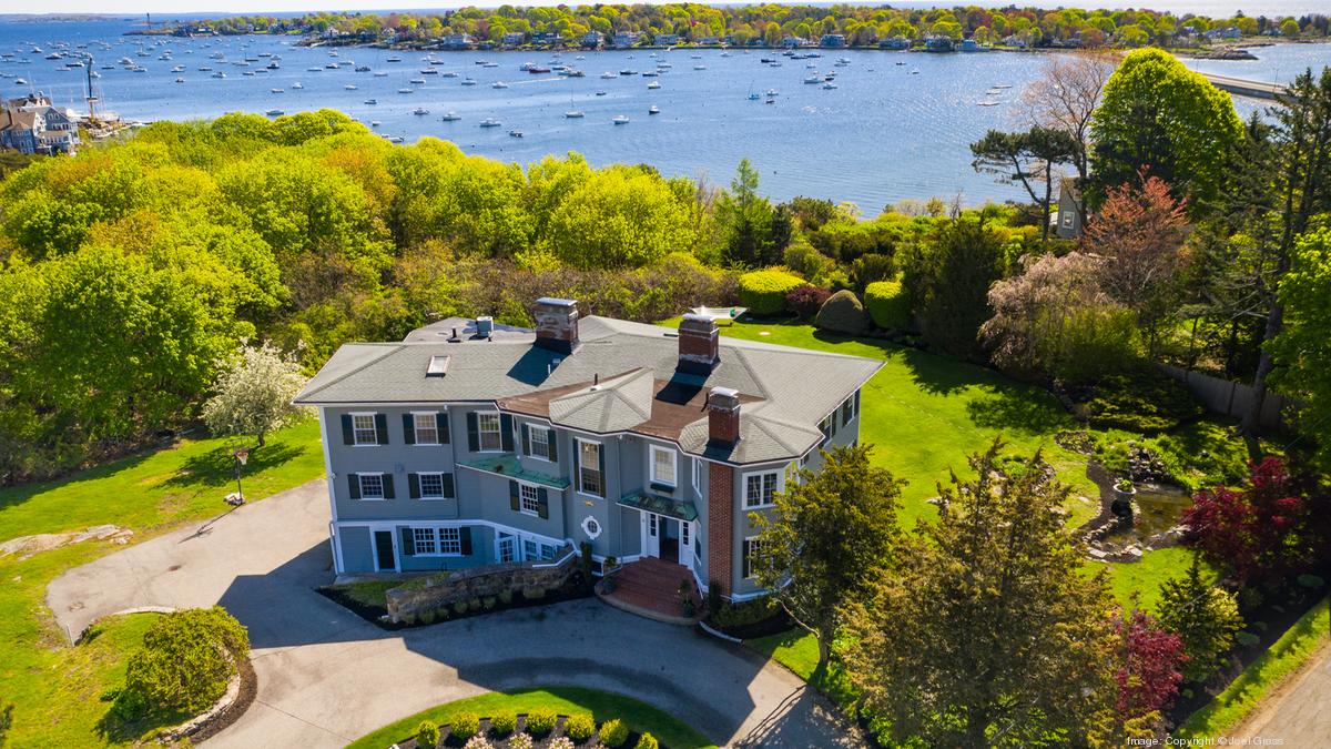 This waterfront Marblehead property has a koi pond and wine cellar