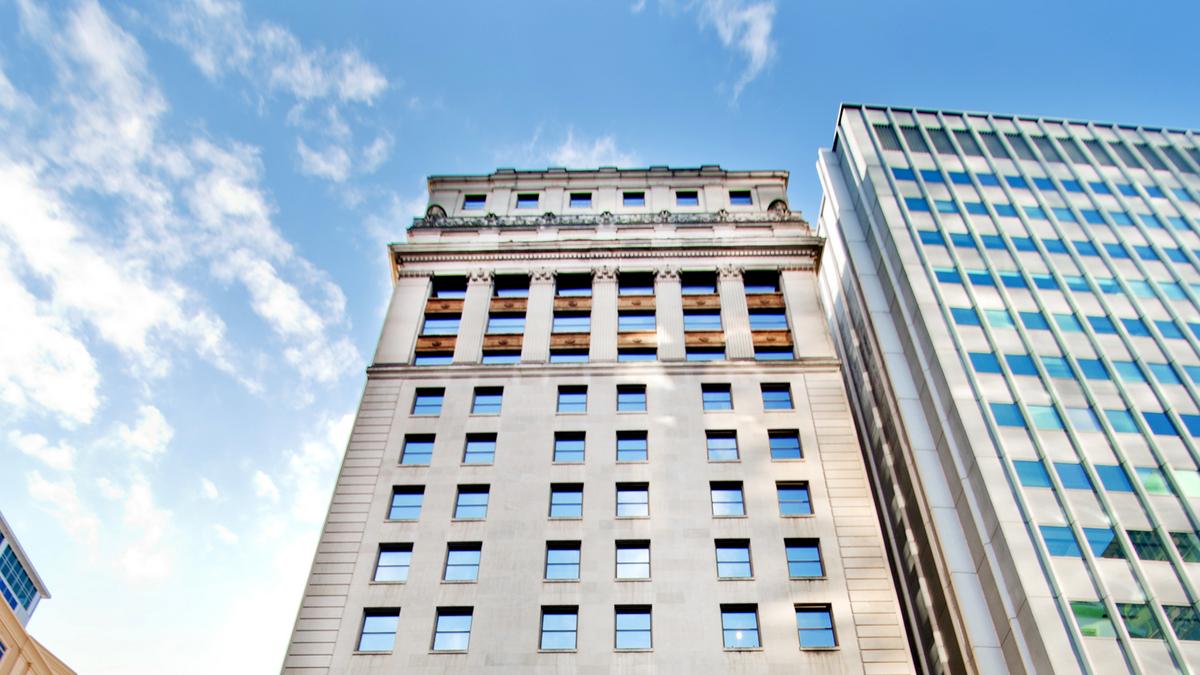 Johnston Building in uptown acquired by Boston's Spaulding & Slye