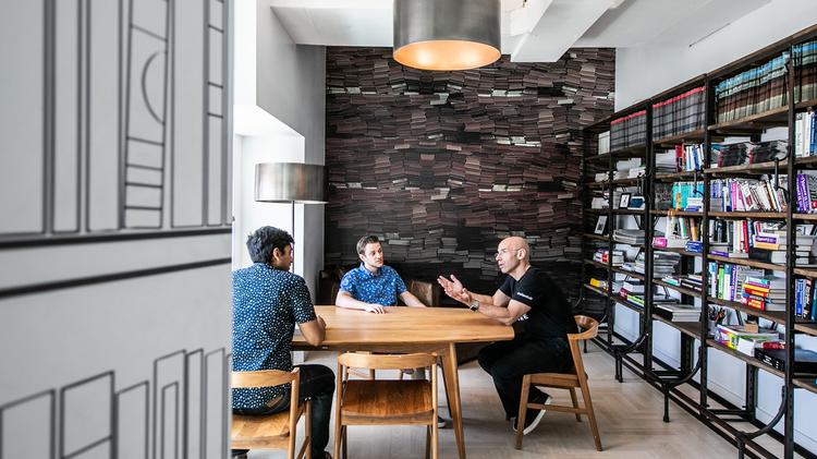 Inside a secret library room, with bookshelves modeled on those found in libraries in the 1940s, at Shutterstock in New York, Aug. 9, 2019. (Jeenah Moon/The New York Times)