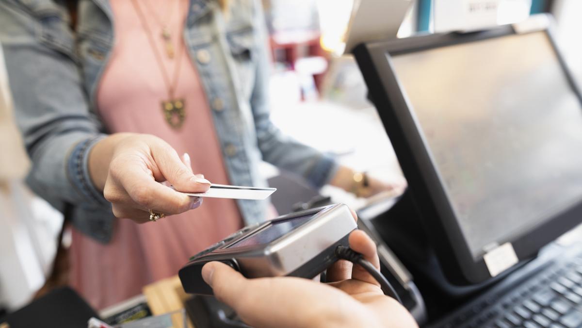Colorado retailers now can charge customers more for paying with credit  cards - Denver Business Journal