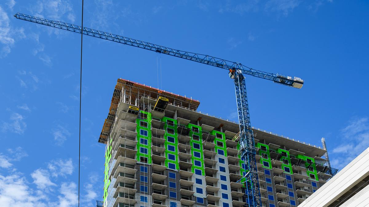 Madison Marquette's The Travis apartment tower in Midtown tops out ...