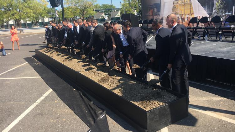 Executives of Comcast-Spectacor and the Cordish Cos. were joined by public officials for a groundbreaking of the $50 million Fusion Arena in South Philadelphia on Wednesday.